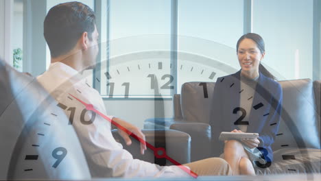 animation of clock over two diverse business people