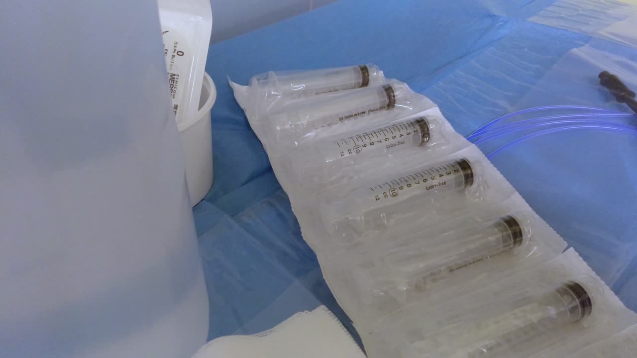 a pack of syringes in the surgery room