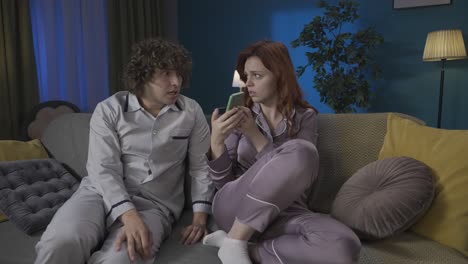 couple arguing about a phone