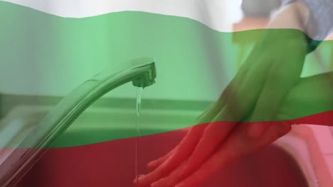 Die-Bulgarische-Flagge-Weht-Gegen-Den-Mittelteil-Einer-Frau,-Die-Sich-Im-Waschbecken-Die-Hände-Wäscht