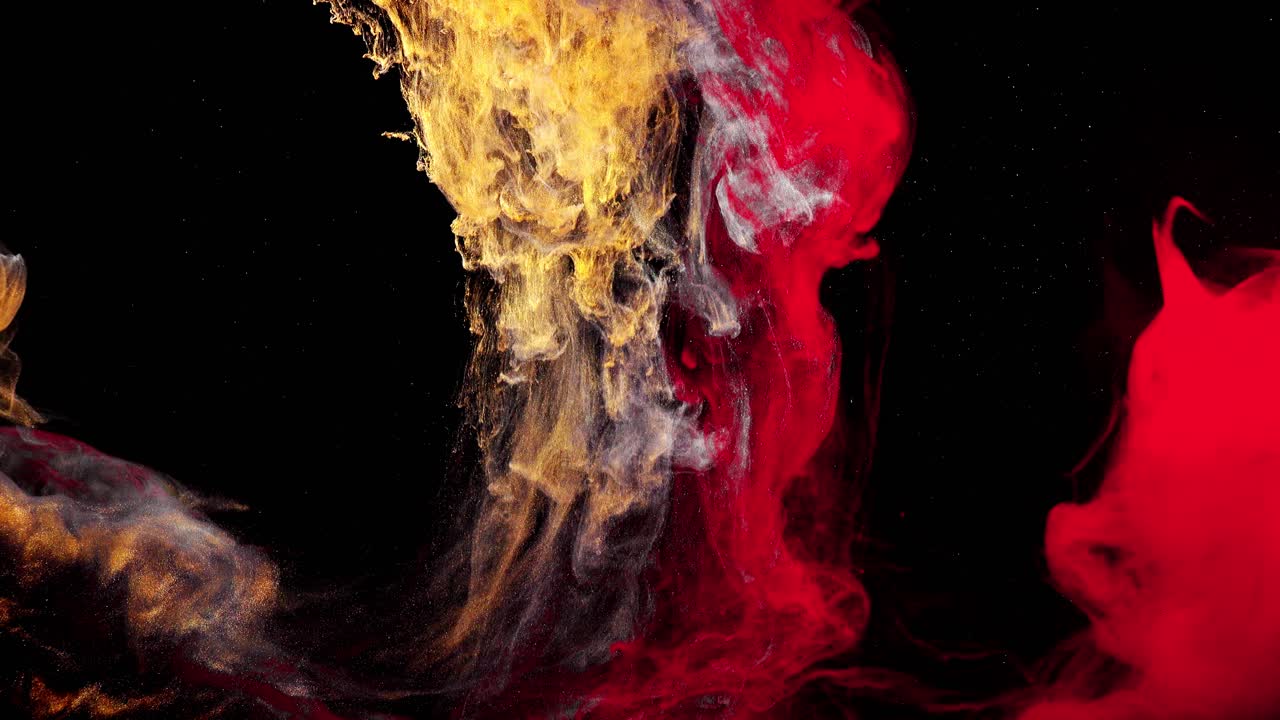 Forme astratte. Riprese su sfondo nero. Mescolanza di colori