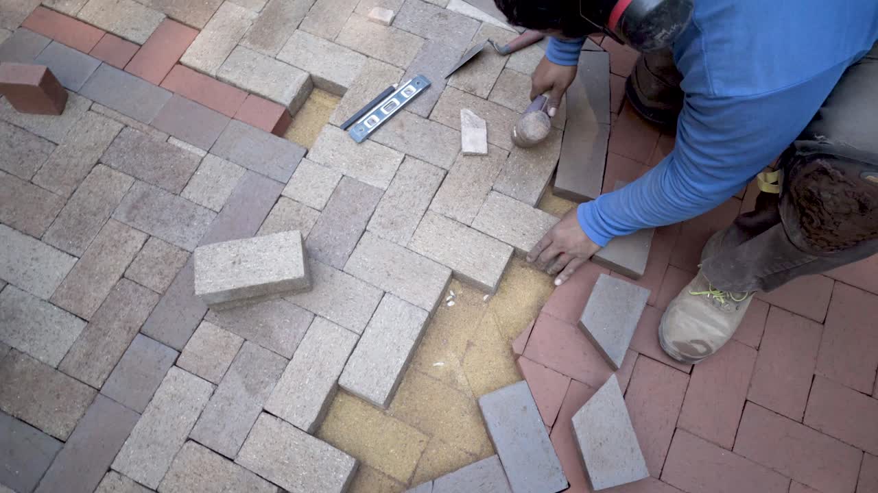 Laying Brick Pavers in a Herringbone Pattern