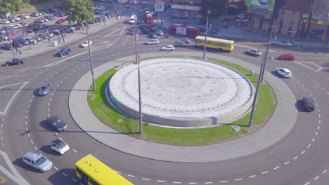 interesting aerial orbiting shot of trg slavija square, belgrade