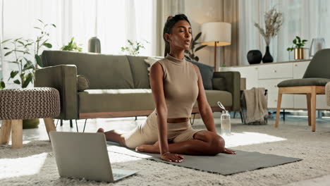 Woman,-yoga-and-stretching-on-floor-with-laptop