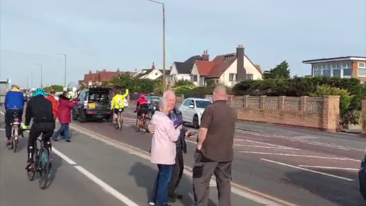 Cyclists Riding on Residential Street