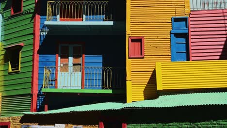 la boca in buenos aires in argentina, colourful houses and buildings with colorful walls lamps and homes in popular iconic tourist destination and tourist attraction