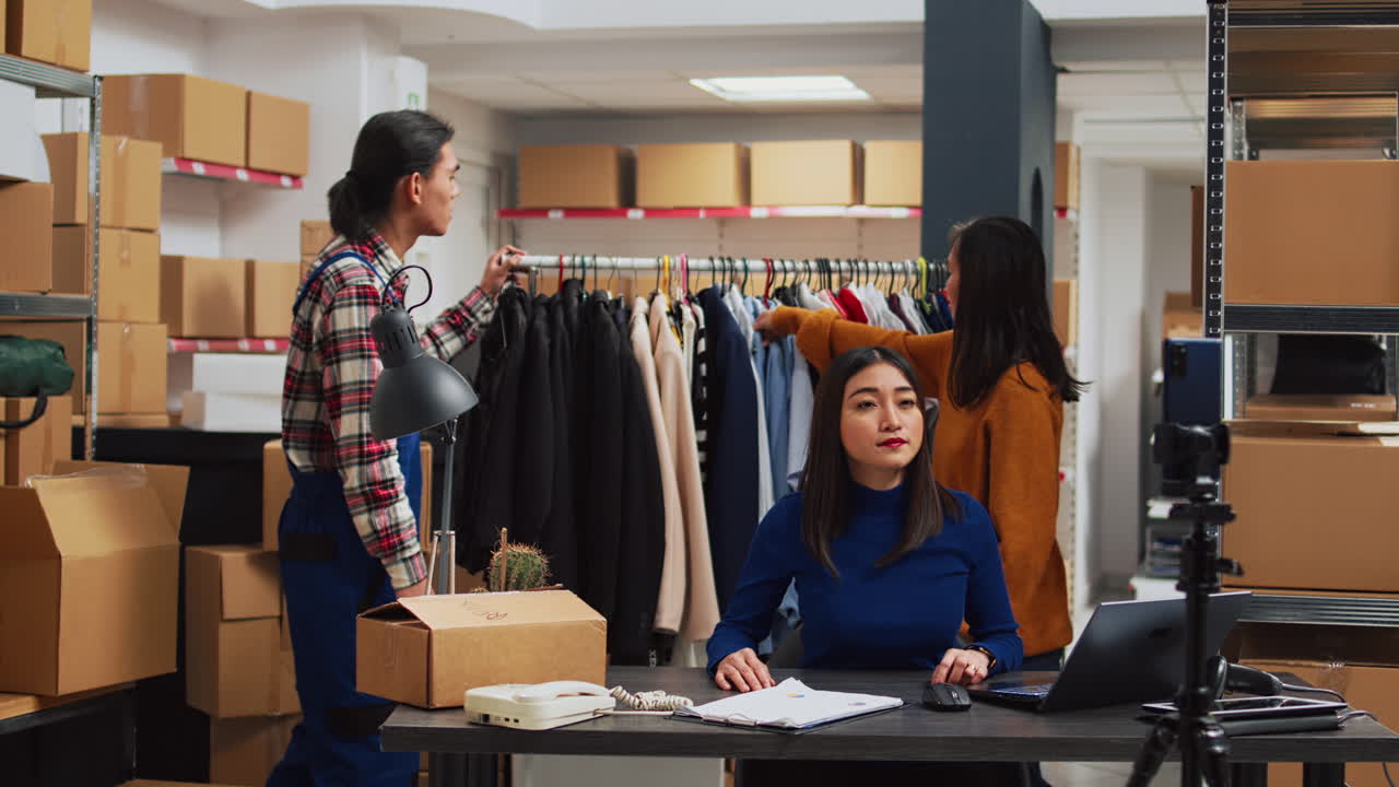 Teamwork in a clothing warehouse