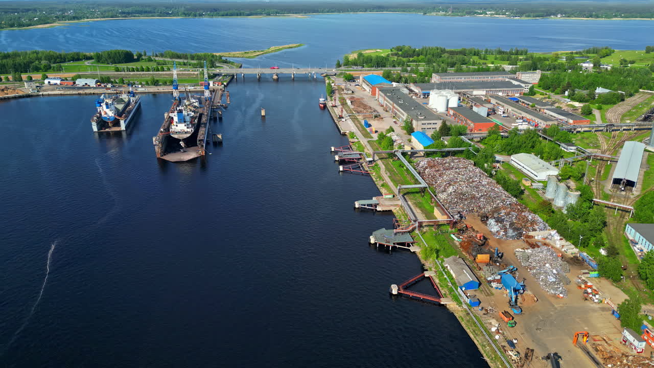 Drone shot of a local harbor in Greece during daytime. Ships halted.