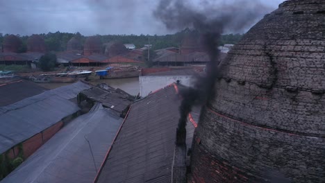 Aerial-view-of-brick-kilns-and-canal-in-Vinh-Long-in-the-Mekong-Delta,-Vietnam