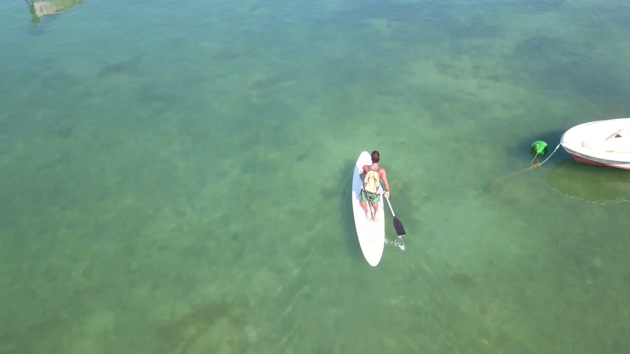 Sailing on table in beaches of Buzios, Brazil