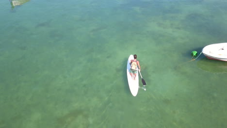 sailing on table in beaches of buzios, brazil