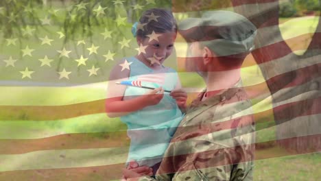 soldado estadounidense sosteniendo a su hija