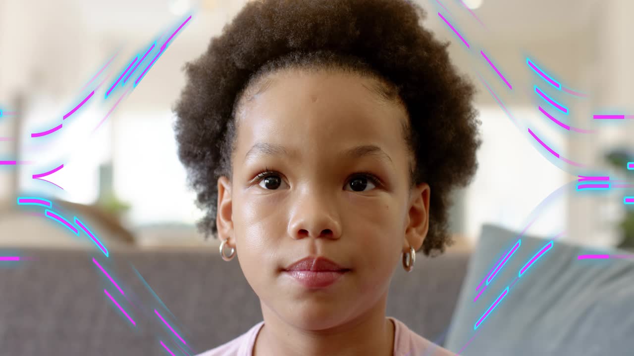 Girl sitting on couch reacting to animated streaks, smiling broadly then relaxing for marketing