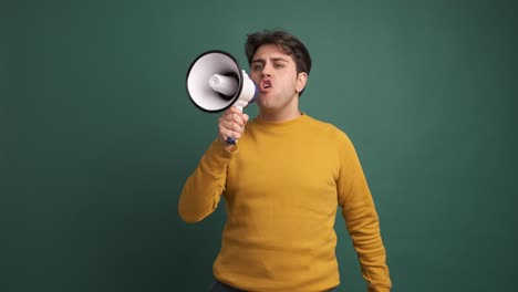 upset caucasian man yelling using a loudspeaker