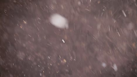 floating abstract particle bokeh on dark background