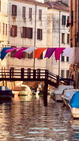 venetian canal with laundry drying