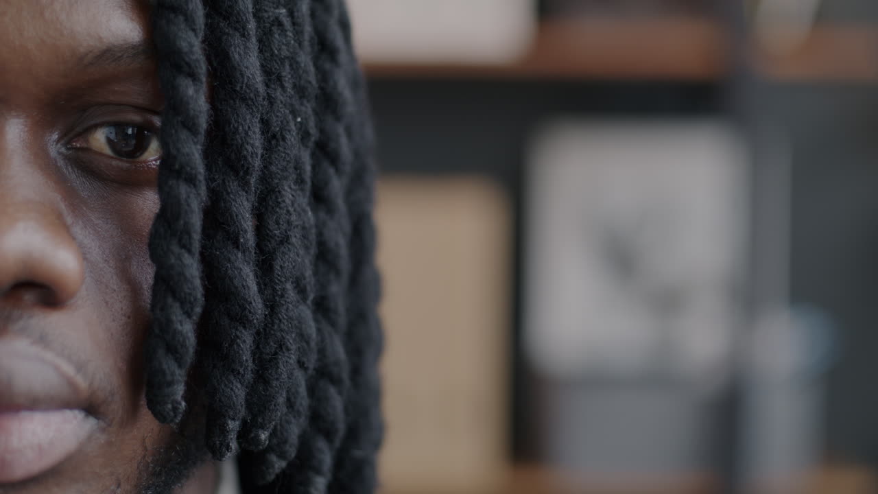 Close-up of a Man with Dreadlocks