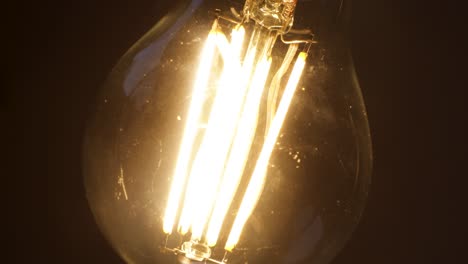 Close-up-warm-light-bulb-LED-switching-on-and-off