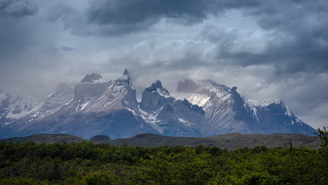 timelapse of andes in torres del paine national park, patagonia, chile, moving clouds over peaks