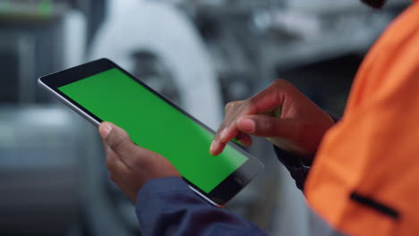 Greenscreen-tablet-engineer-hands-at-plant-closeup.-Man-surfing-mockup-screen