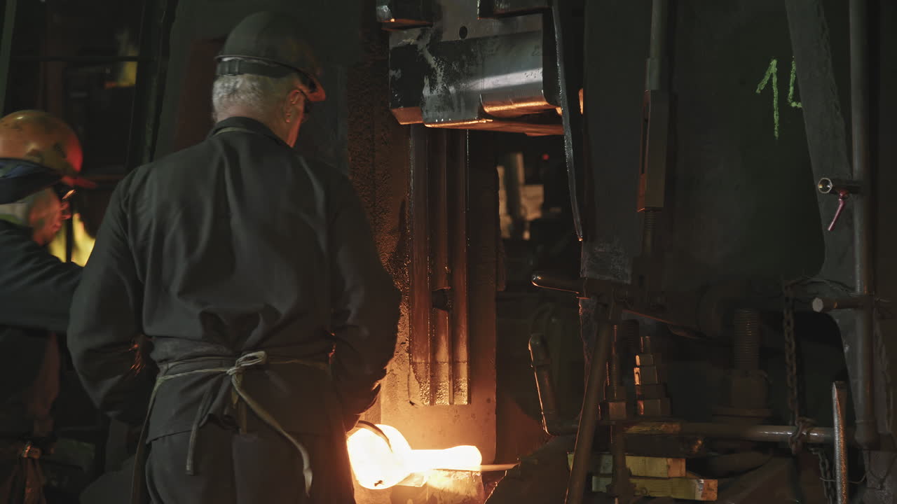 Forge Shop Workers Forging Steel