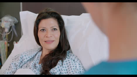 over shoulder view of patient having discussion with nurse