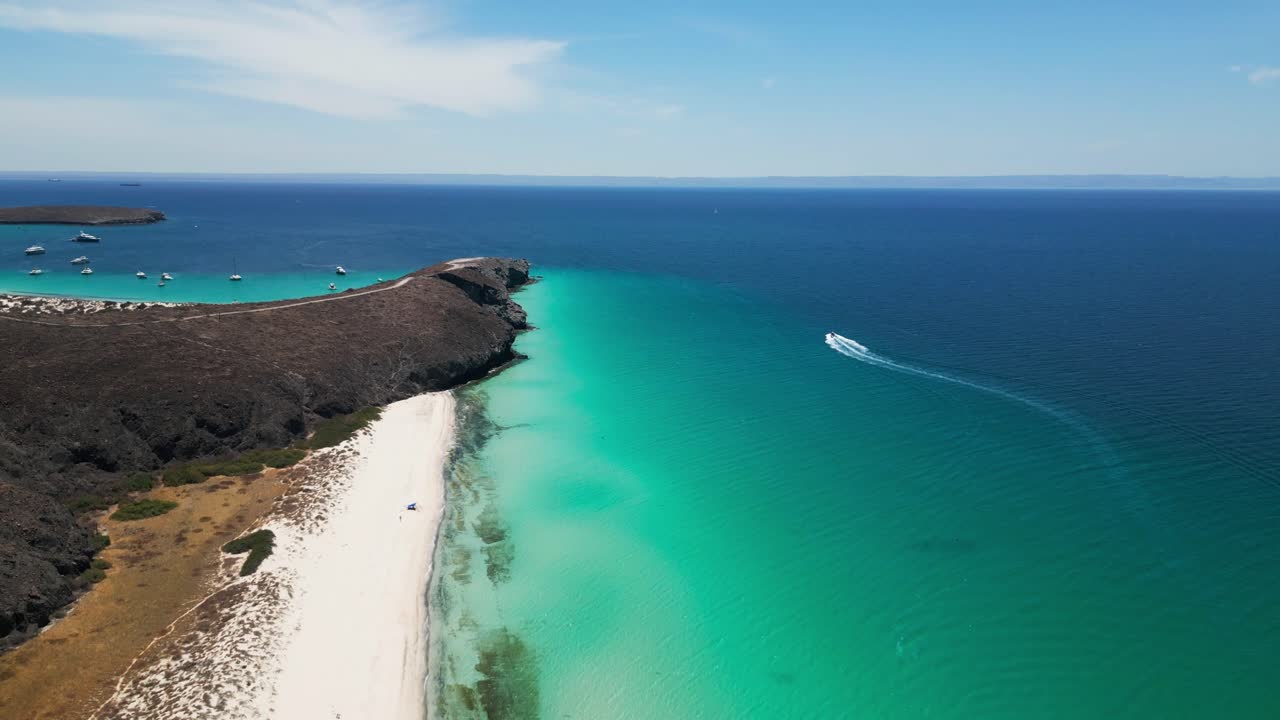 Beautiful aerial view of Tecolandra Beach in La Paz, Mexico, with calm turquoise waters