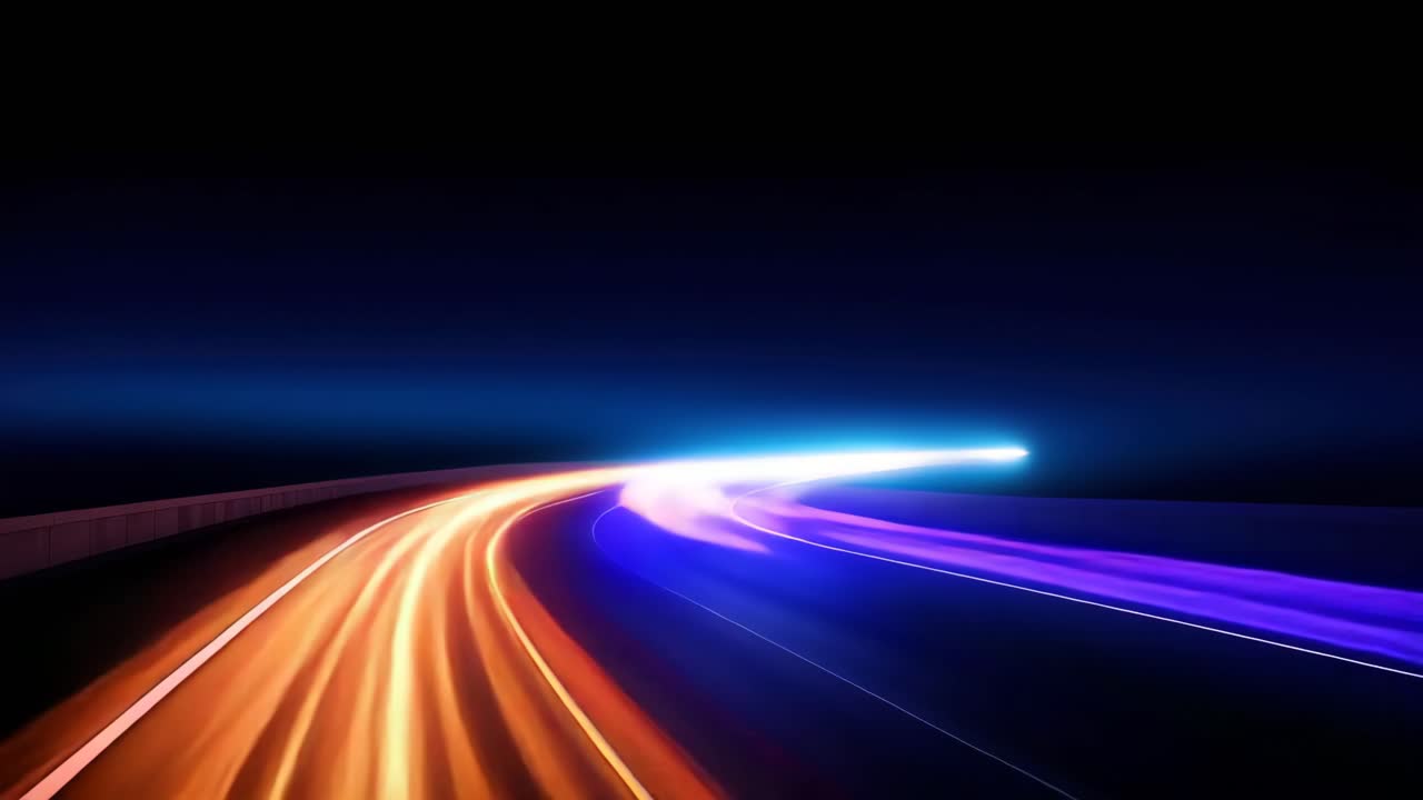 Dynamic long-exposure shot of a highway at night, capturing light trails