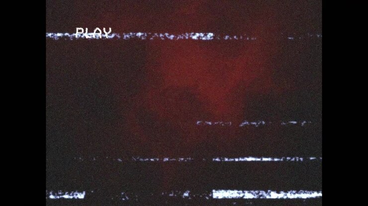 Animation of play text on screen with glitch