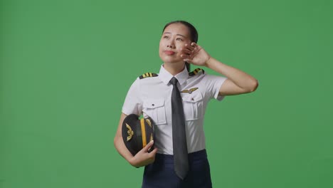 asian female pilot in uniform