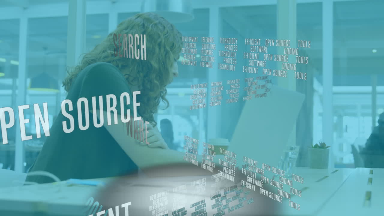 Animation of data processing over businesswoman using laptop