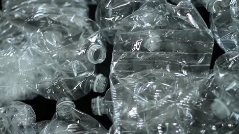 recycled-plastic-bottles-on-a-table-keeping-the-environment-green-no-people-stock-footage