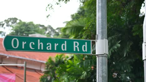 orchard road sign and buildings ,