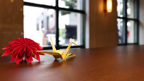 static display of paper flowers indoors