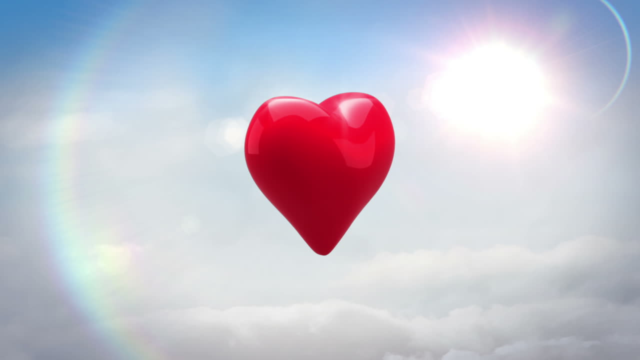 은 심장이 파란 하늘 위에서 돌고 폭발합니다.