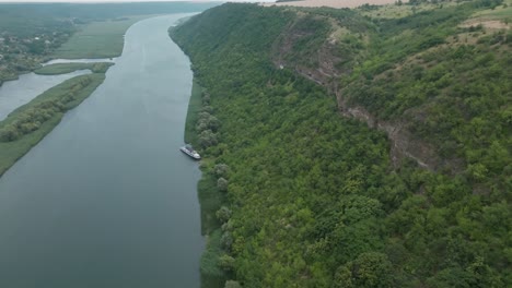 holding-the-image-of-a-boat-that-is-on-the-river-bank-at-one-point-with-a-parallax-perspective-change-from-bottom-to-top