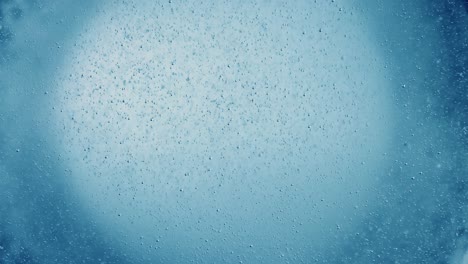 oxygen bubbles in water on a blue abstract background