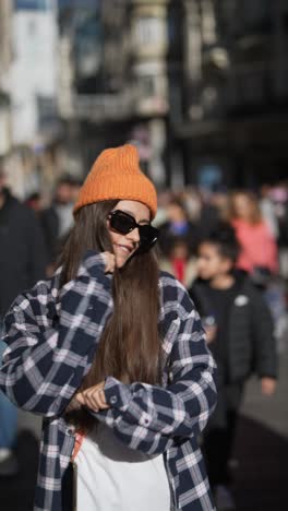 young woman dancing in the city street