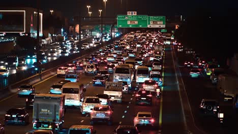 Evening rush hour traffic moves slowly in Dubai, with vehicles heading towards Sharjah, UAE