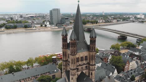 4k-drone-footage-circling-the-historical-Great-Saint-Martin-Church-of-Cologne,-Germany
