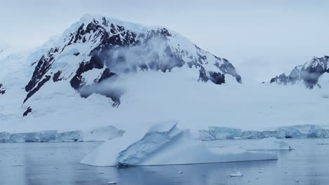 Antarctica-Iceberg-Mountains-and-Ocean,-Beautiful-Dramatic-Blue-Coastal-Landscape-and-Seascape-on-Antarctic-Peninsula-Coast,-Icy-Winter-Sea-Scene-with-Ice