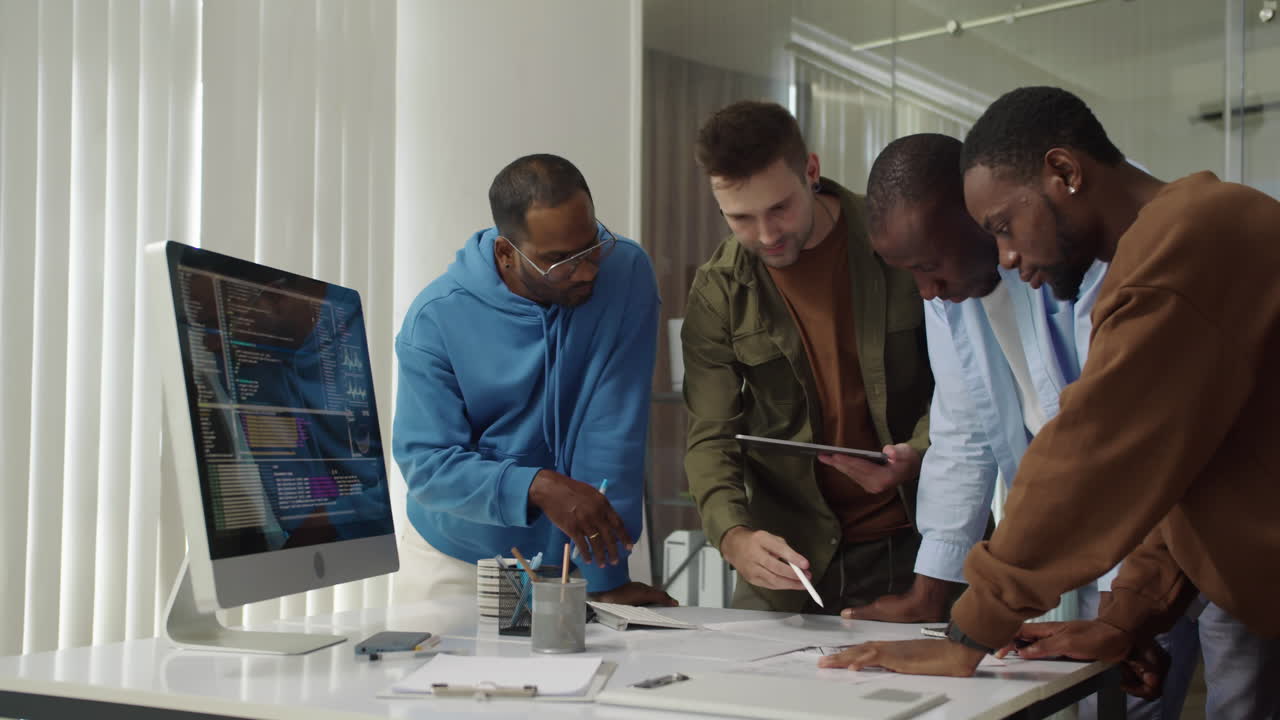 IT Specialists Searching for Bags in Programming Code on Computer