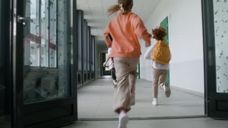 pupils running in the corridor.