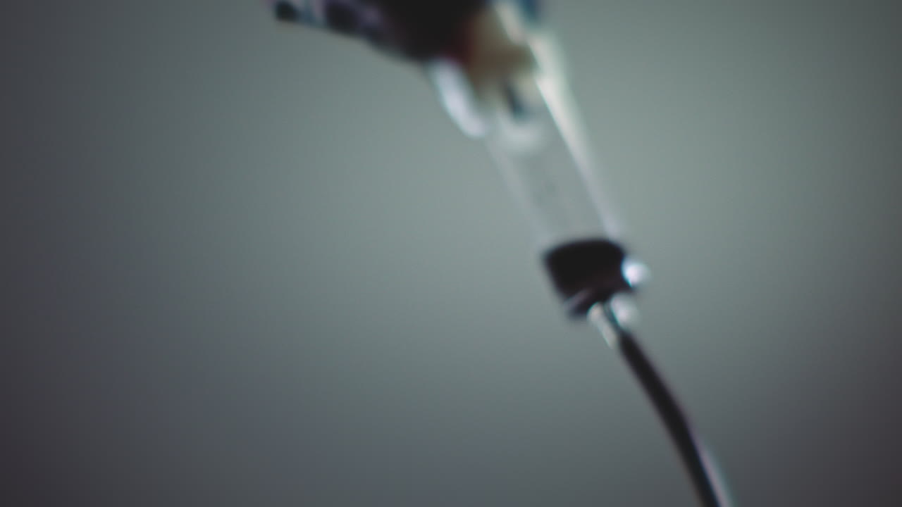 Dark liquid is dripping slowly