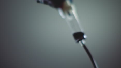 dark liquid is dripping slowly
