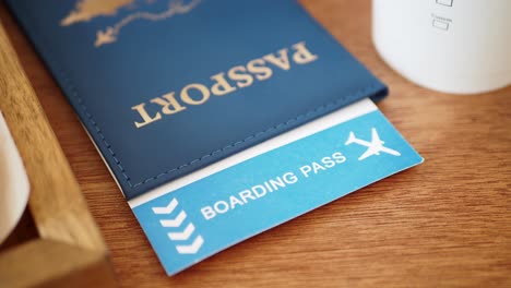 passport and boarding pass on table