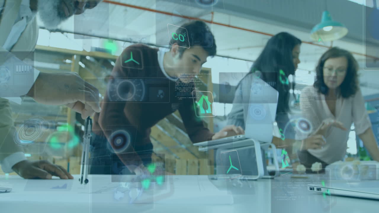 Collaborating on animation project, young professionals using digital interface in office