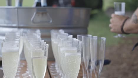 wine glasses sit at wedding