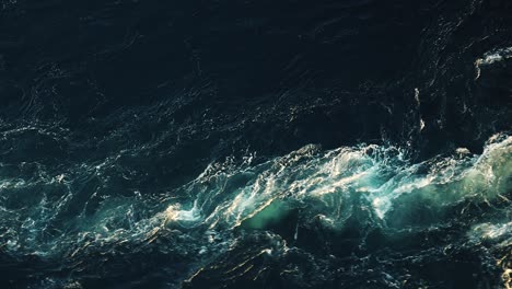 Waves-of-water-of-the-river-and-the-sea-meet-each-other-during-high-tide-and-low-tide.