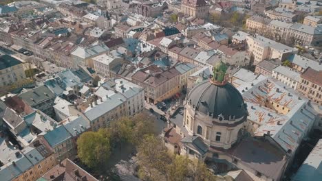 aerial view of a city with a church